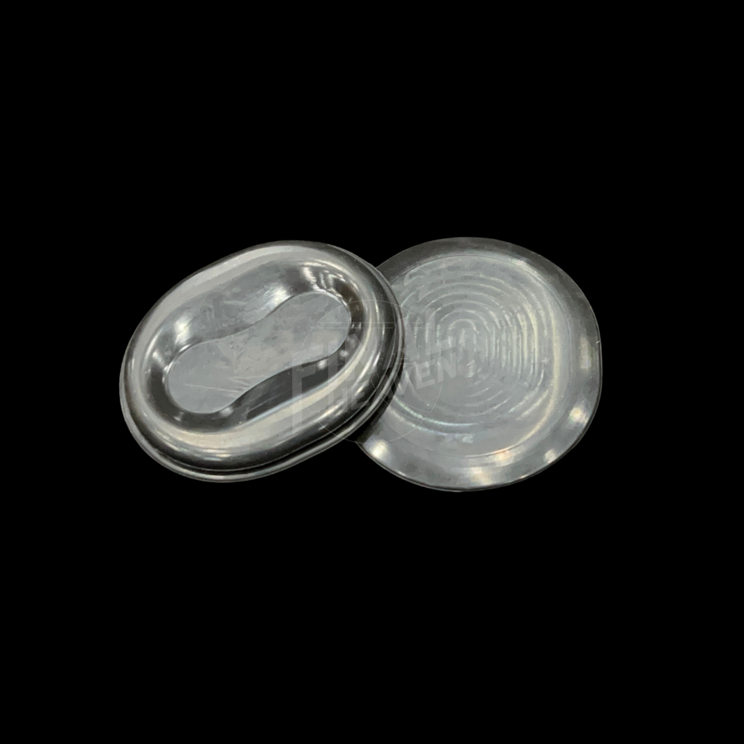 A pair of black rubber grommets designed for the rear valance of a Datsun 280Z or Datsun 260Z