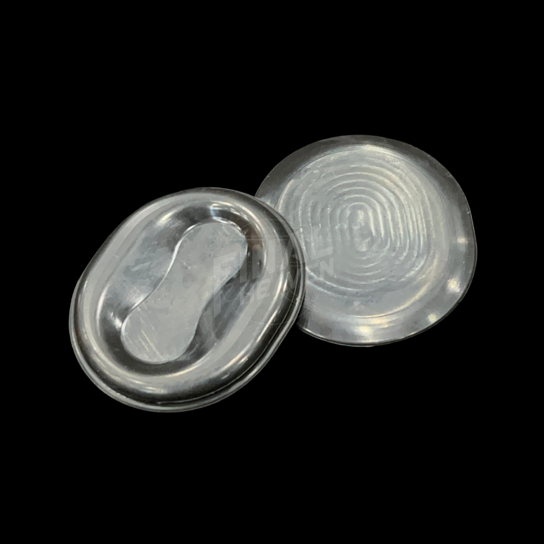 A pair of black rubber grommets designed for the rear valance of a Datsun 280Z or Datsun 260Z