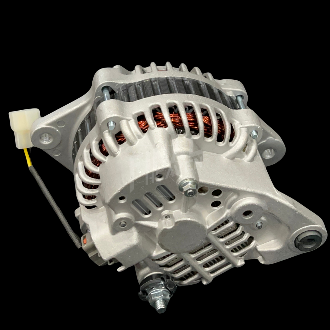 An 80A IC Alternator for vehicles such as 240Zs, Hakosukas, and 510s, featuring a metallic body with cooling fins, terminal connectors, and a fan.