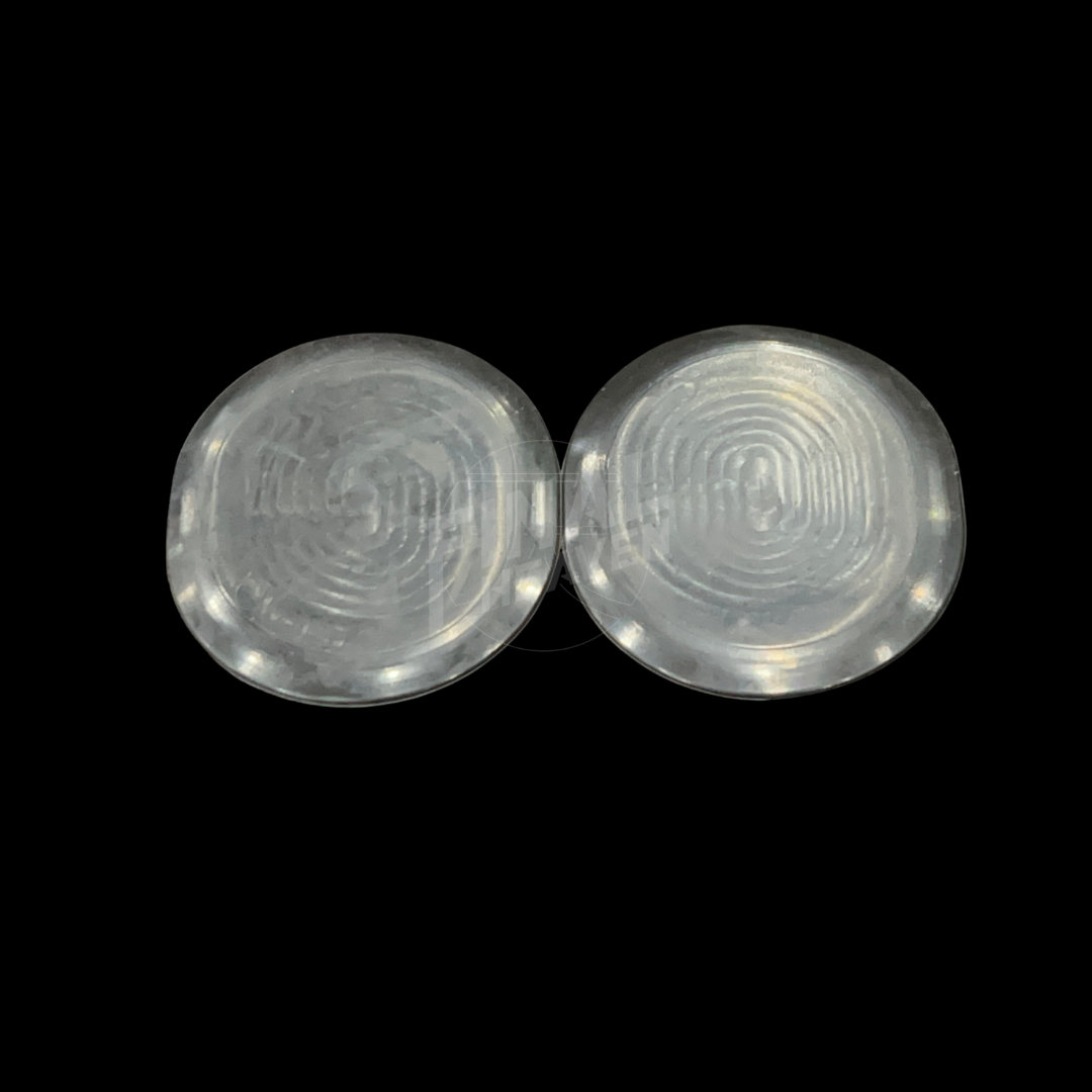 A pair of black rubber grommets designed for the rear valance of a Datsun 280Z or Datsun 260Z