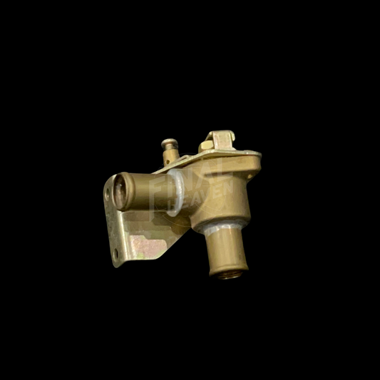 A gold-colored heater valve for a Nissan Hakosuka GT/GTX/GT-R 4Dr.