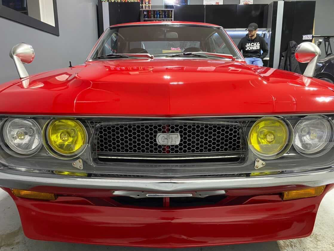 Red Toyota Celica Liftback with Yellow and Clear SEV Marchal 130mm headlights