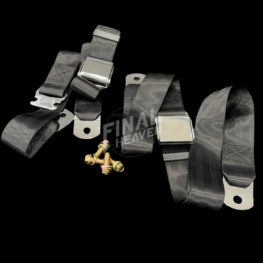 Two black vehicle seatbelts with metal buckles and bolts good for use on a KGC10 Nissan Hakosuka Skyline