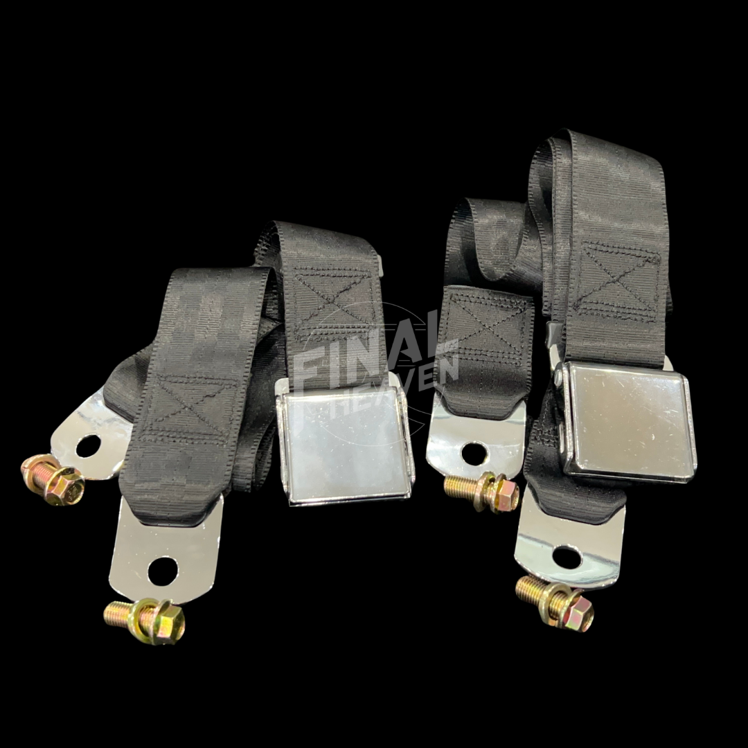 Two black vehicle seatbelts with metal buckles and bolts good for use on a KGC10 Nissan Hakosuka Skyline