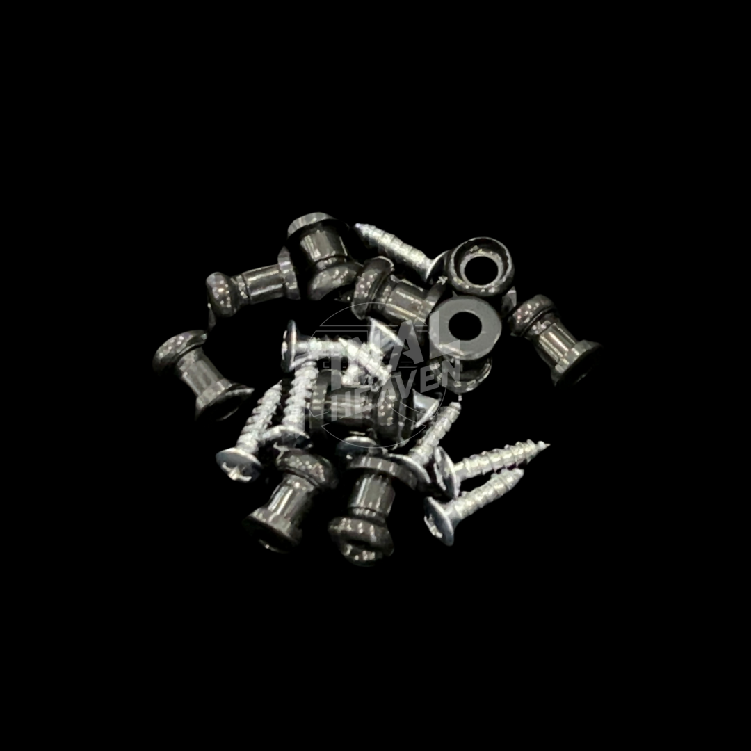 A collection of silver carpet hooks and screws for a Nissan KGC10 Hakosuka Skyline