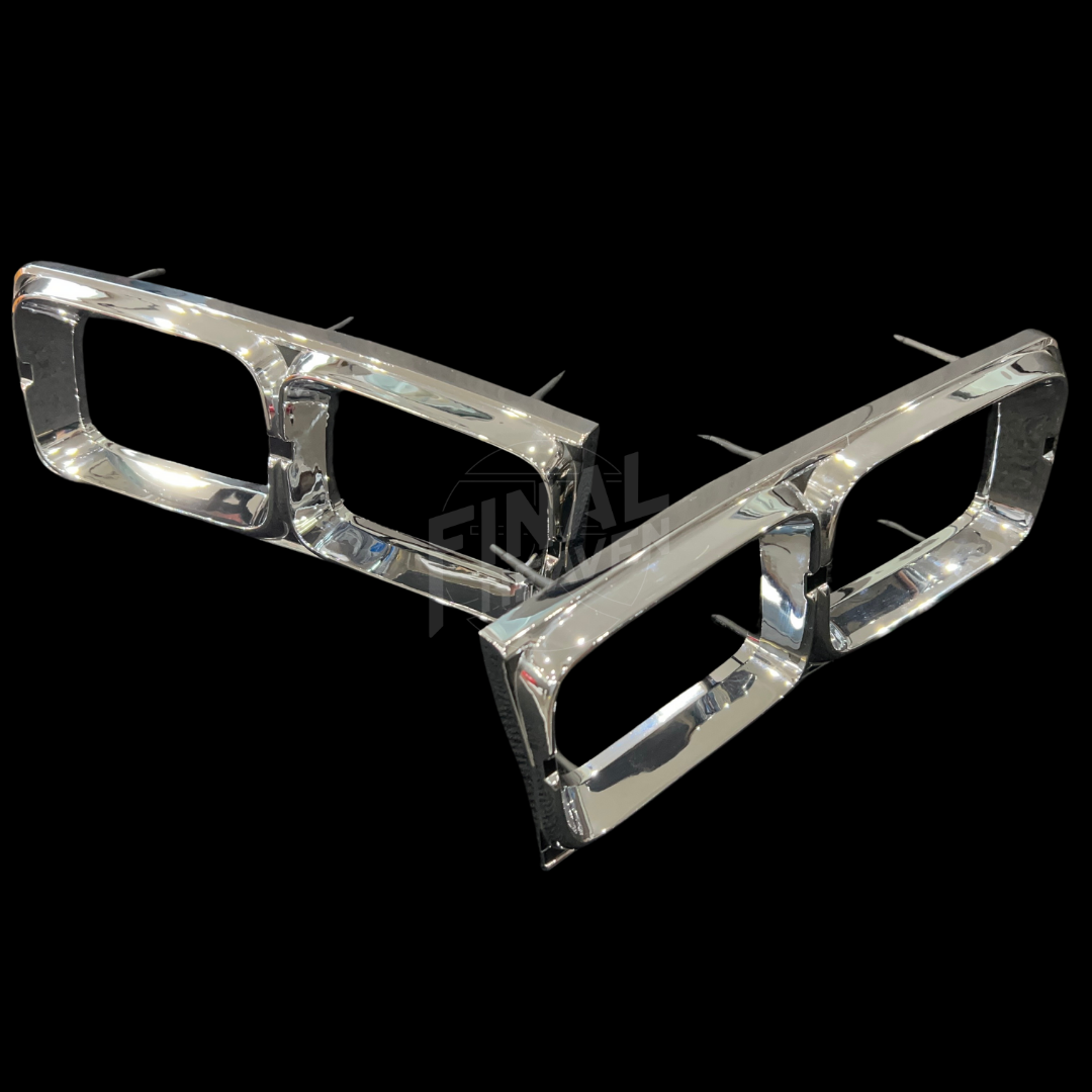 A pair of chrome Kouki Nissan Hakosuka Tail Light Trims KGC10