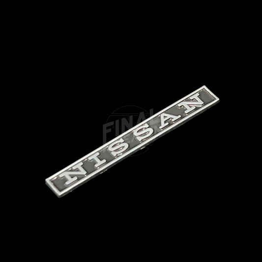 KGC10 Nissan Hakosuka Rear garnish emblem