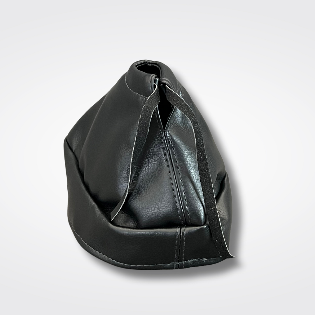 A vinyl shift boot for a KGC10 Nissan Skyline 2000GT Hakosuka produced by MSpeed