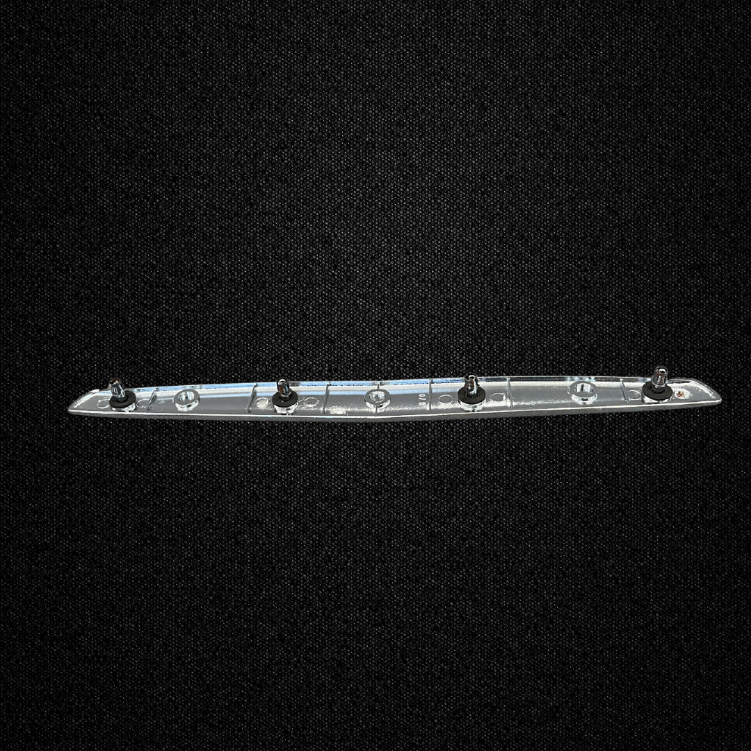 A red trunk emblem for a KPGC10 Nissan Skyline 2000GT Hakosuka produced by MSpeed