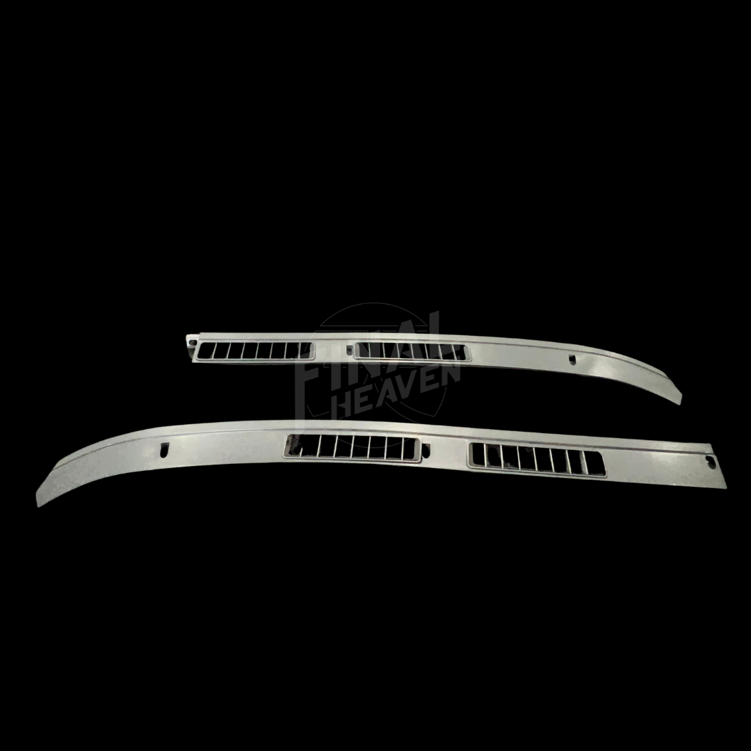 A set of two black dashboard vent covers for Nissan Hakosuka Zenki