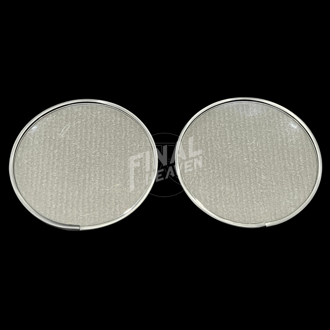 A set of two round gauge lenses with a rubber rim, intended for use in a Nissan Hakosuka instrument cluster.