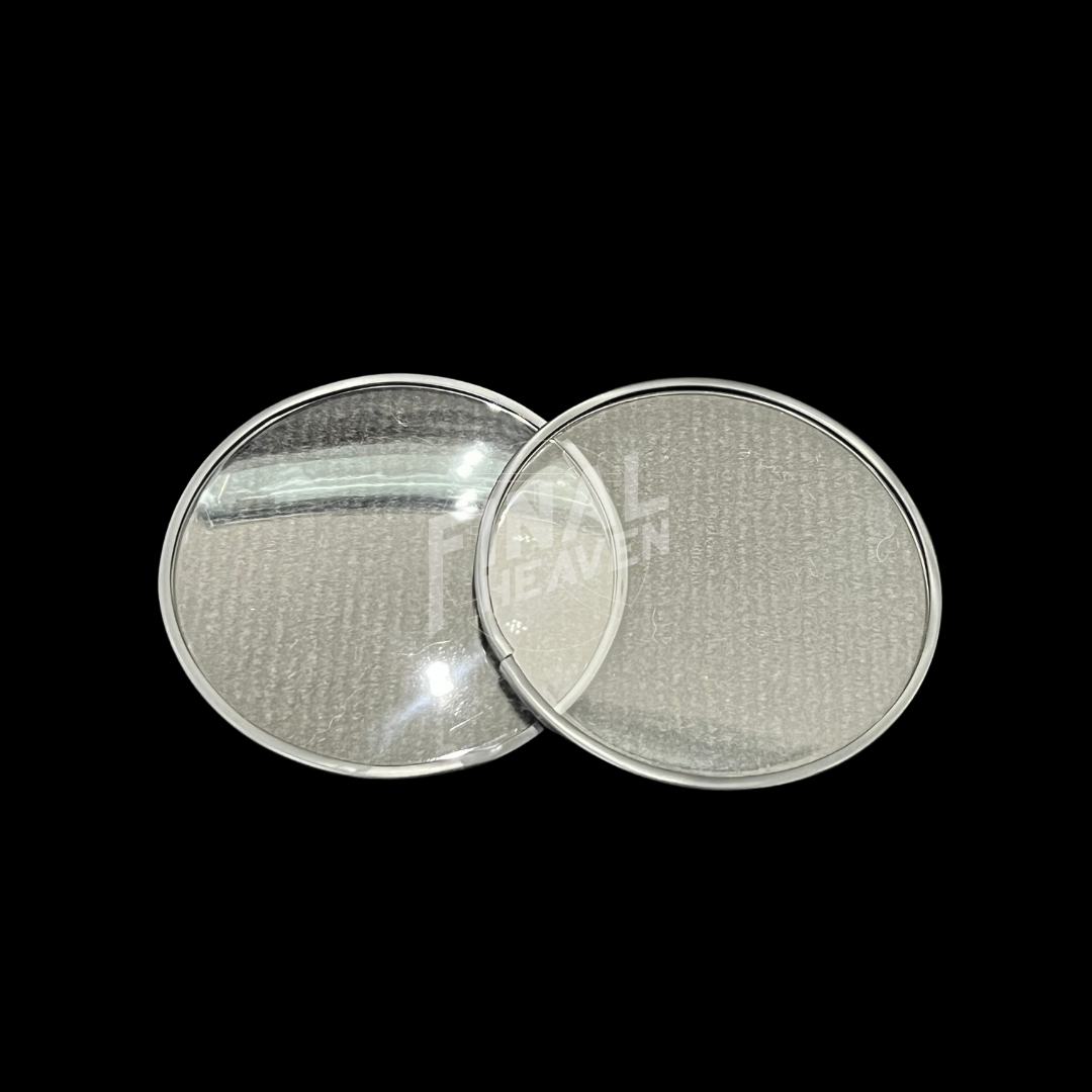 A set of two round gauge lenses with a rubber rim, intended for use in a Nissan Hakosuka instrument cluster.
