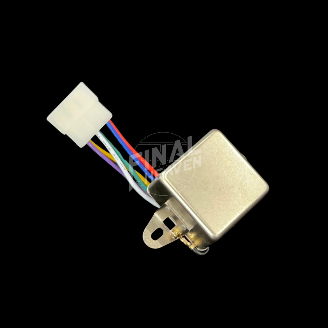 A silver headlight relay with a white connector and multicolored wires for a Nissan Skyline KGC10 or Hakosuka