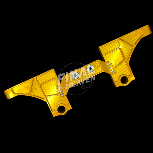A gold-colored machined aluminum reinforced differential crossmember for Datsun 240Z 260Z or 280Z - Escort.