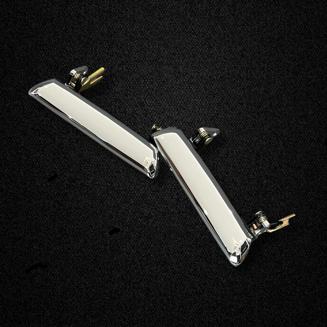 A set of outer door handles for a KGC10 Nissan Skyline 2000GT Hakosuka produced by MSpeed