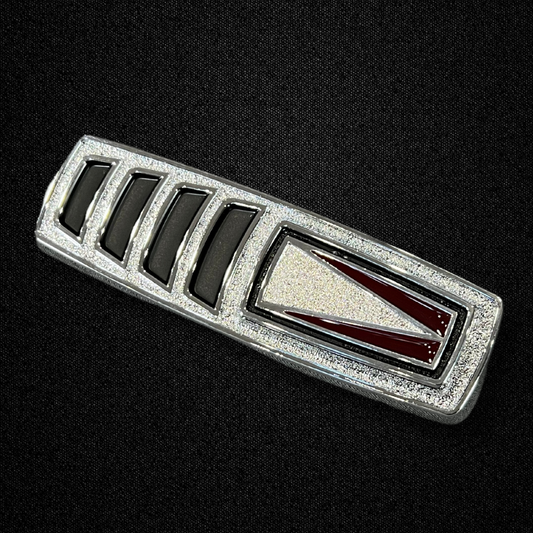 A rear fender wind cutter emblem for a KGC10 Nissan Skyline 2000GT Hakosuka produced by MSpeed