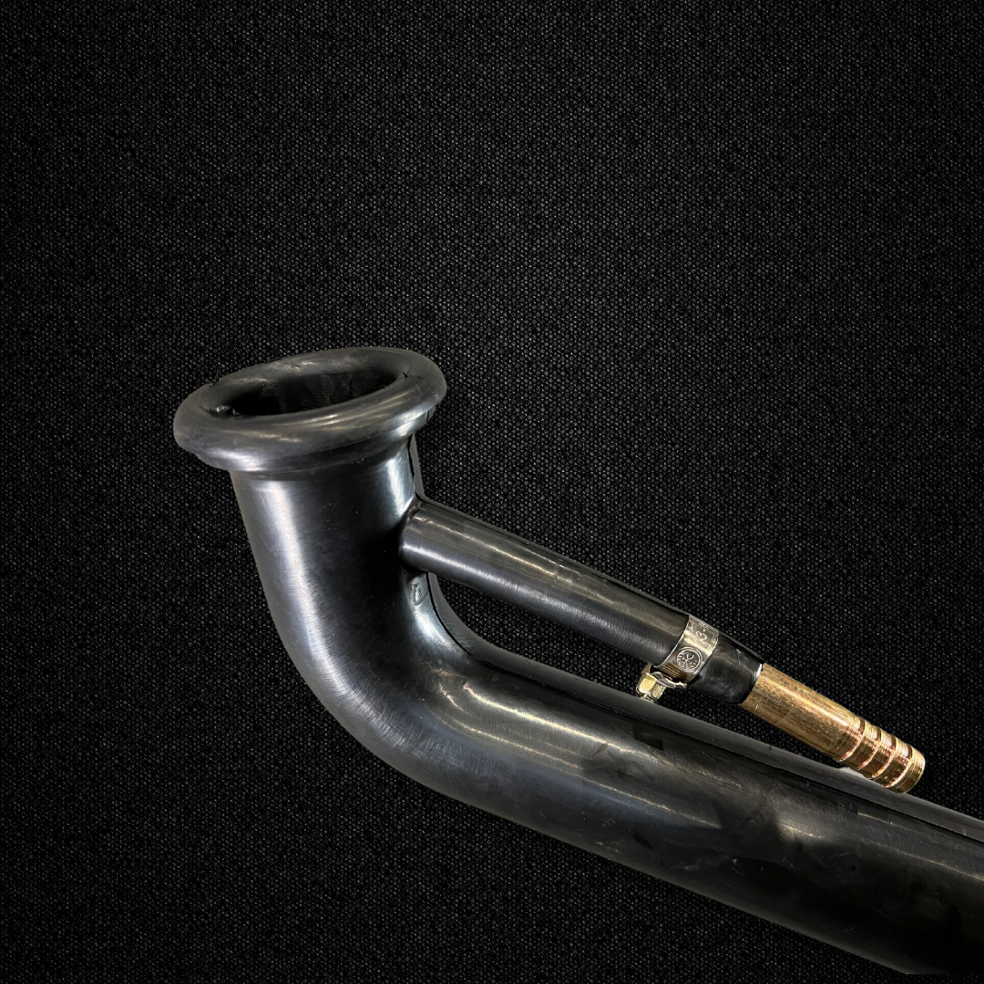 A rubber fuel filler neck for a KGC10 Nissan Skyline 2000GT Hakosuka produced by MSpeed