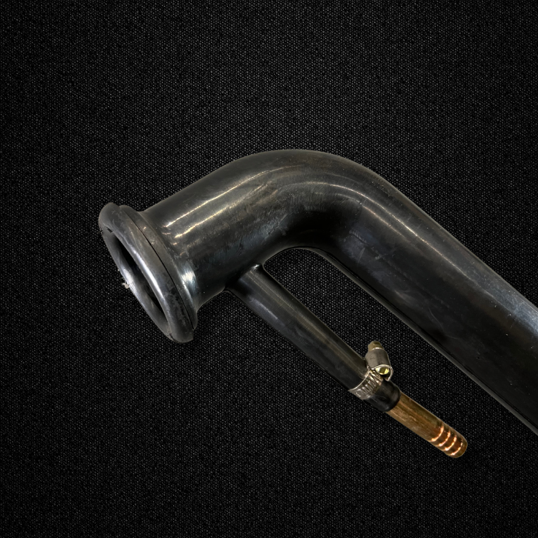 A rubber fuel filler neck for a KGC10 Nissan Skyline 2000GT Hakosuka produced by MSpeed