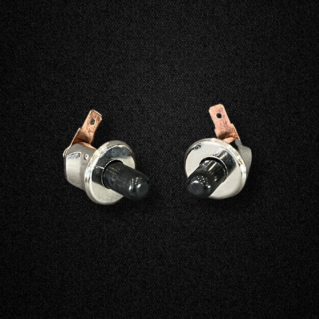 A set of door switches for a KGC10 Nissan Skyline 2000GT Hakosuka produced by MSpeed