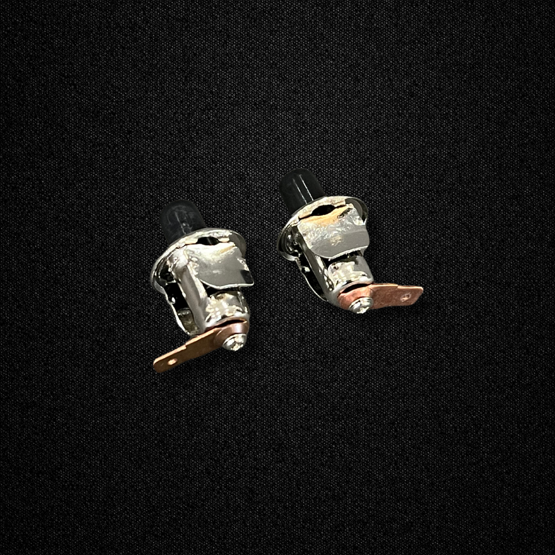 A set of door switches for a KGC10 Nissan Skyline 2000GT Hakosuka produced by MSpeed