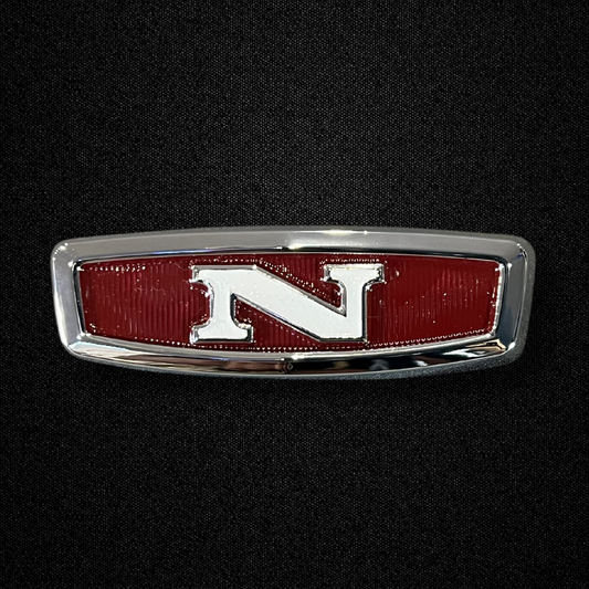 A front grille emblem for an early GC10 Nissan Skyline 2000GT Hakosuka produced by MSpeed