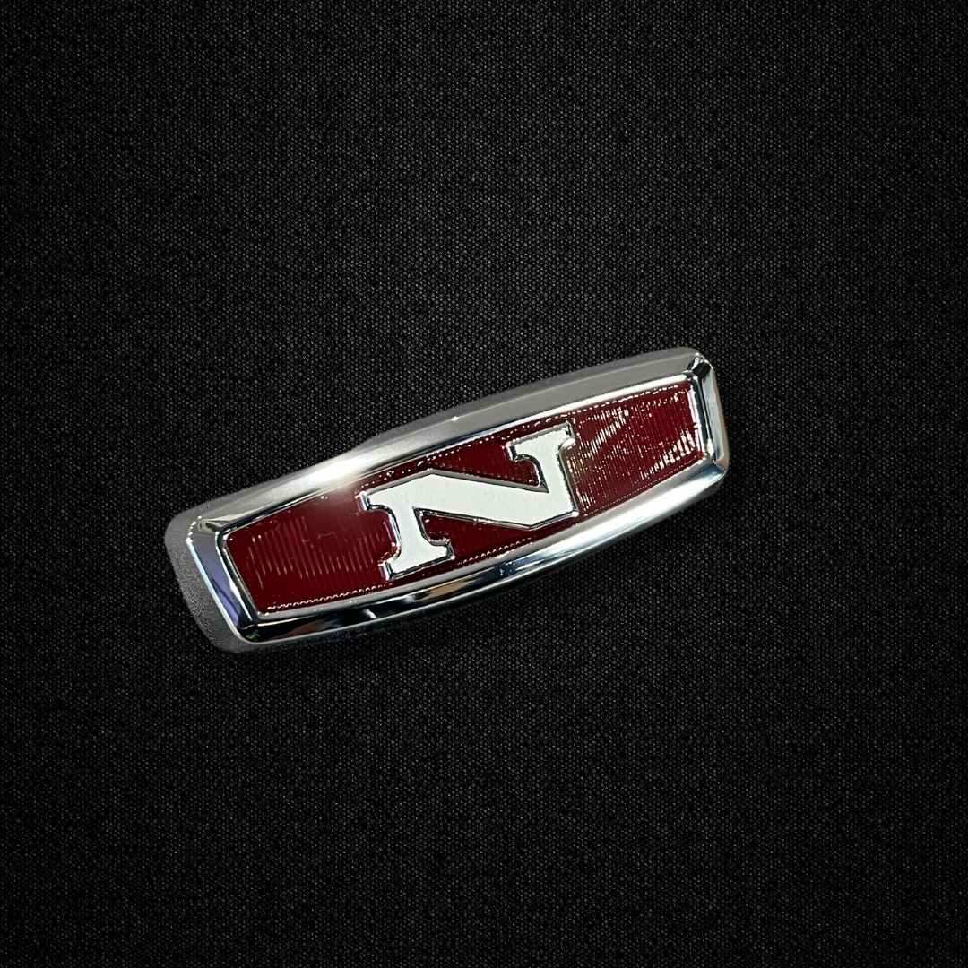 A front grille emblem for an early GC10 Nissan Skyline 2000GT Hakosuka produced by MSpeed