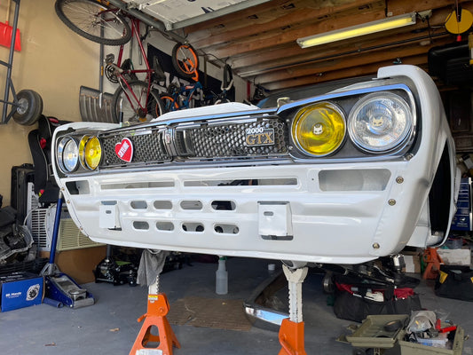 White Nissan Hakosuka KGC10 with Yellow and Clear 130mm SEV Marchal headlights