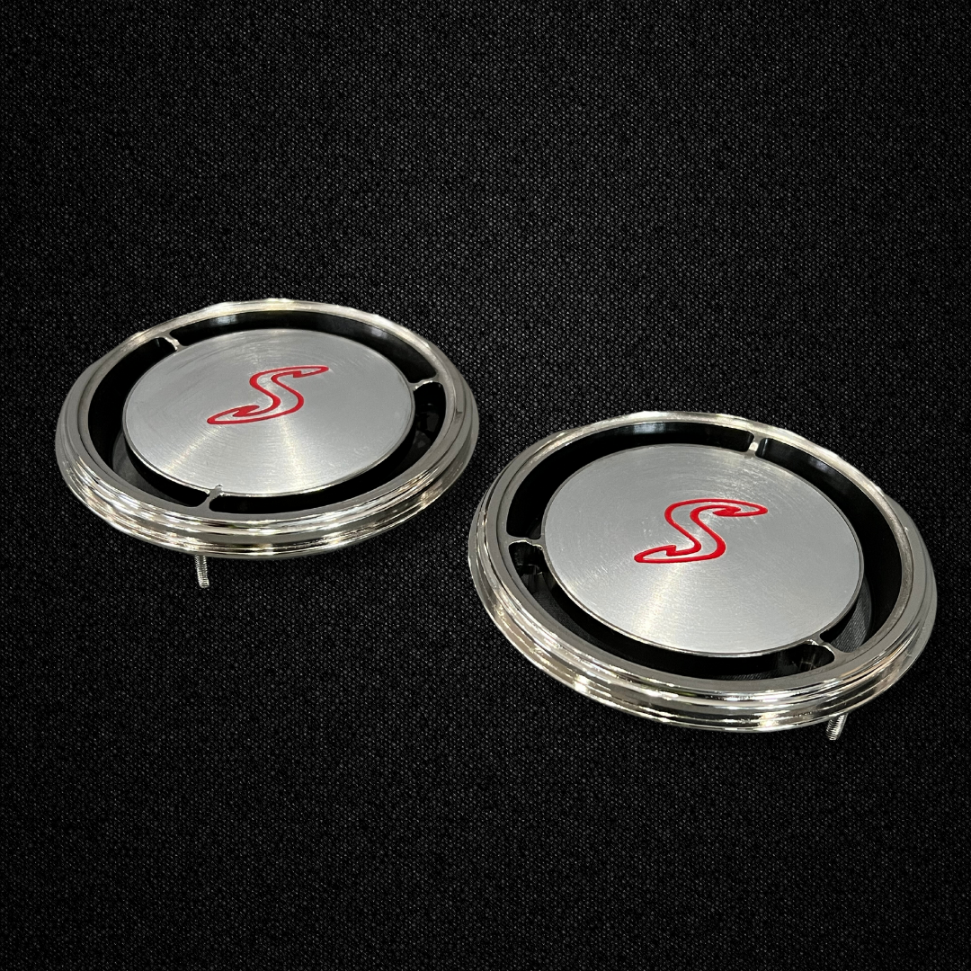 A set of rear quarter panel vent covers with S mark for a KGC10 Nissan Skyline 2000GT Hakosuka produced by MSpeed