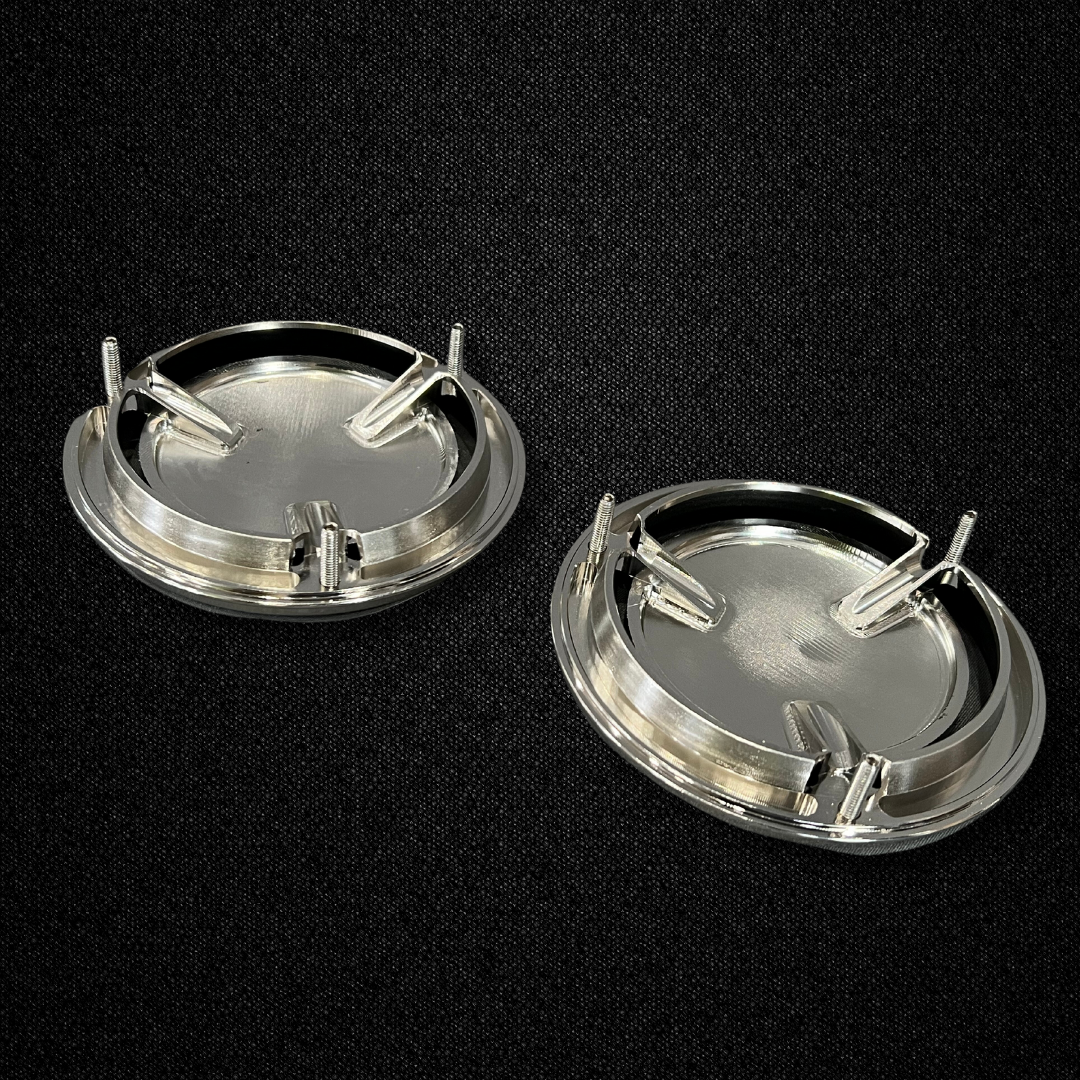 A set of rear quarter panel vent covers with S mark for a KGC10 Nissan Skyline 2000GT Hakosuka produced by MSpeed