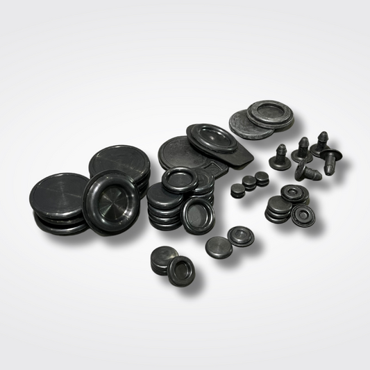 A set of rubber floor plugs for a KGC10 Nissan Skyline 2000GT Hakosuka produced by MSpeed