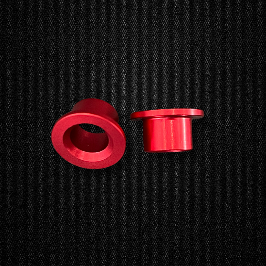 A set of aluminum transmission bushings for a KGC10 Nissan Skyline 2000GT Hakosuka produced by MSpeed