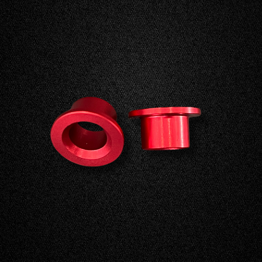 A set of aluminum transmission bushings for a KGC10 Nissan Skyline 2000GT Hakosuka produced by MSpeed