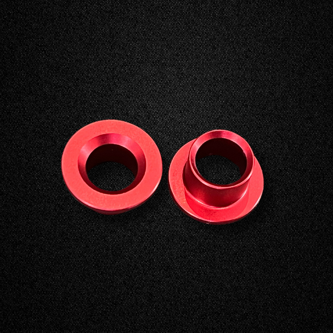 A set of aluminum transmission bushings for a KGC10 Nissan Skyline 2000GT Hakosuka produced by MSpeed