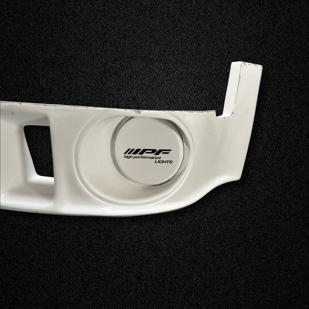 A Porsche 911 Turbo (930) FRP front lower spoiler produced by Auto Garage TBK.