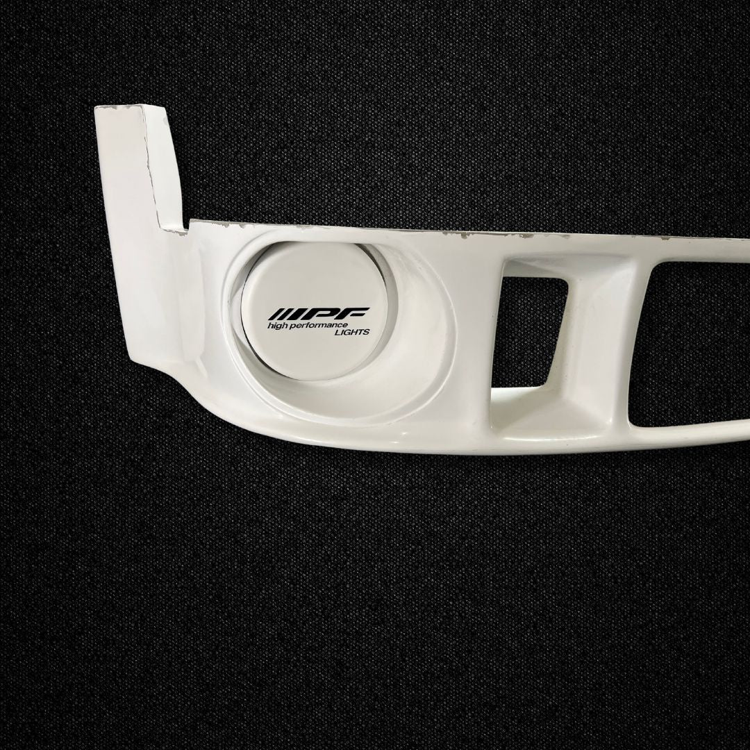 A Porsche 911 Turbo (930) FRP front lower spoiler produced by Auto Garage TBK.