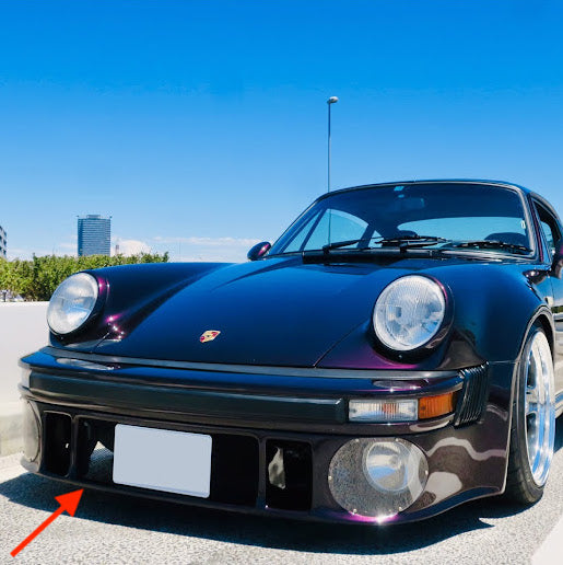 A Porsche 911 Turbo (930) FRP front lower spoiler produced by Auto Garage TBK.