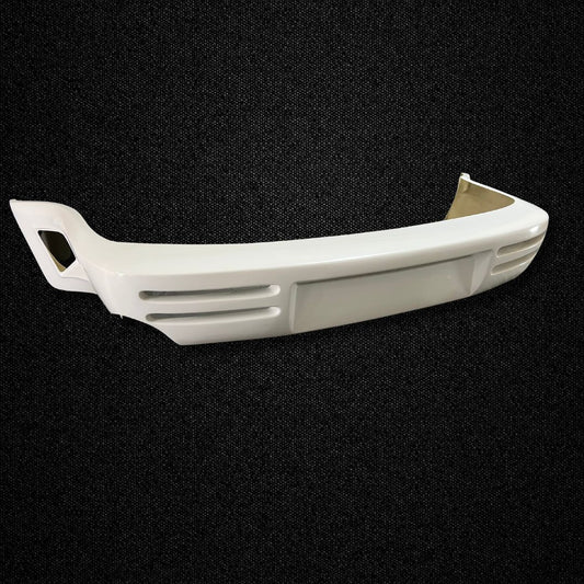 A Porsche 911 Turbo (930) FRP rear bumper produced by Auto Garage TBK.