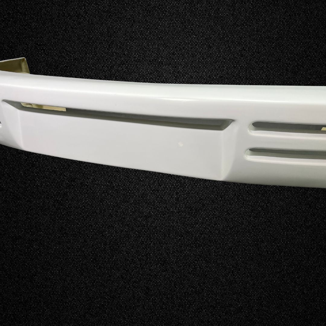 A Porsche 911 Turbo (930) FRP rear bumper produced by Auto Garage TBK.