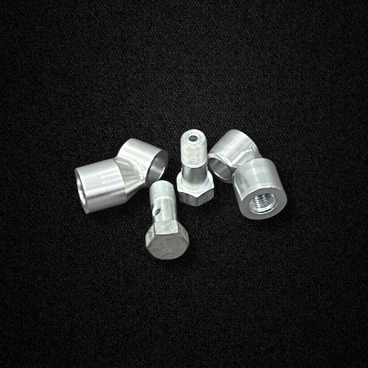 A brake banjo kit for use with Sumitomo MK63 calipers on a KGC10 Nissan Skyline 2000GT Hakosuka produced by MSpeed