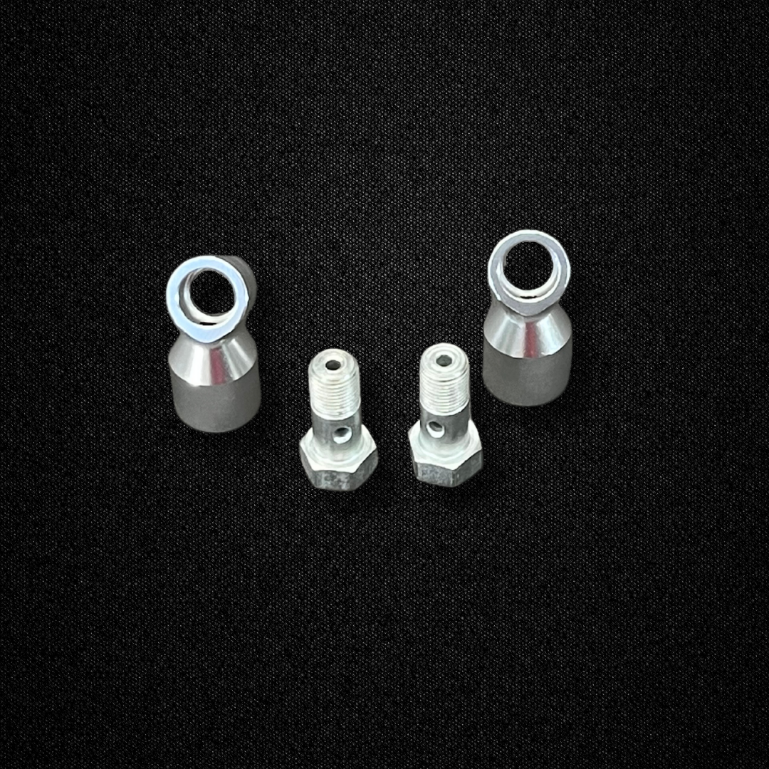 A brake banjo kit for use with Sumitomo MK63 calipers on a KGC10 Nissan Skyline 2000GT Hakosuka produced by MSpeed