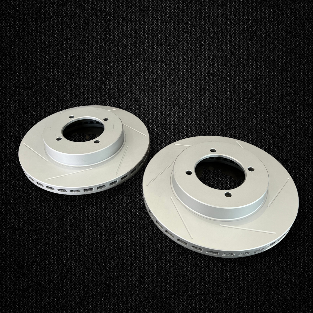 A set of 260mm ventilated brake rotors for a KGC10 Nissan Skyline 2000GT Hakosuka with Sumitomo MK63 calipers produced by MSpeed