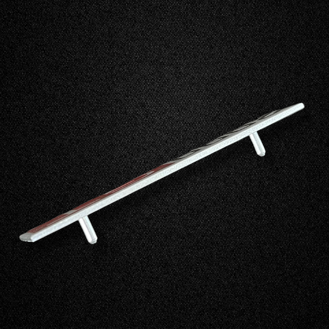 A center console emblem for a KGC10 Nissan Skyline 2000GT Hakosuka produced by MSpeed