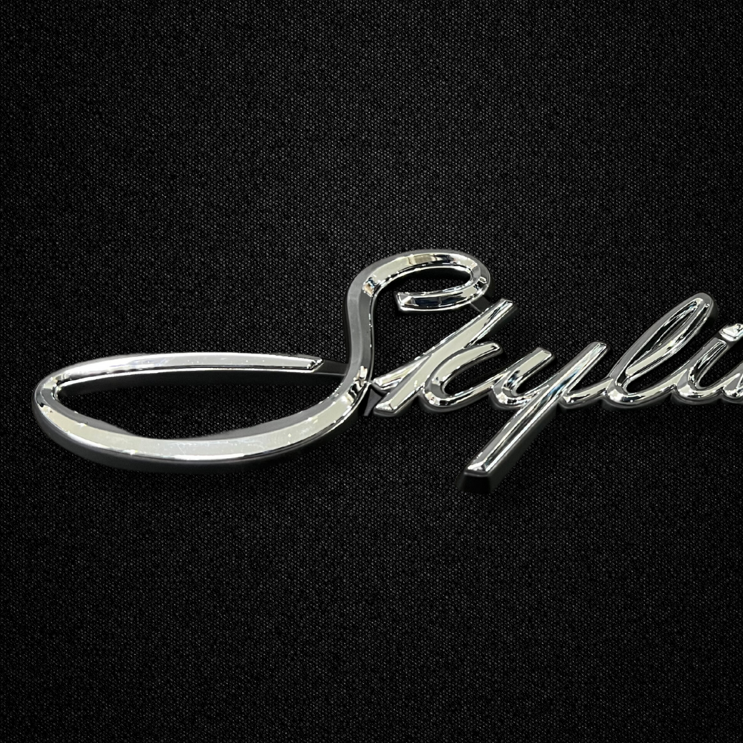 A SKYLINE front fender emblem for a KGC10 Nissan Skyline 2000GT Hakosuka produced by MSpeed