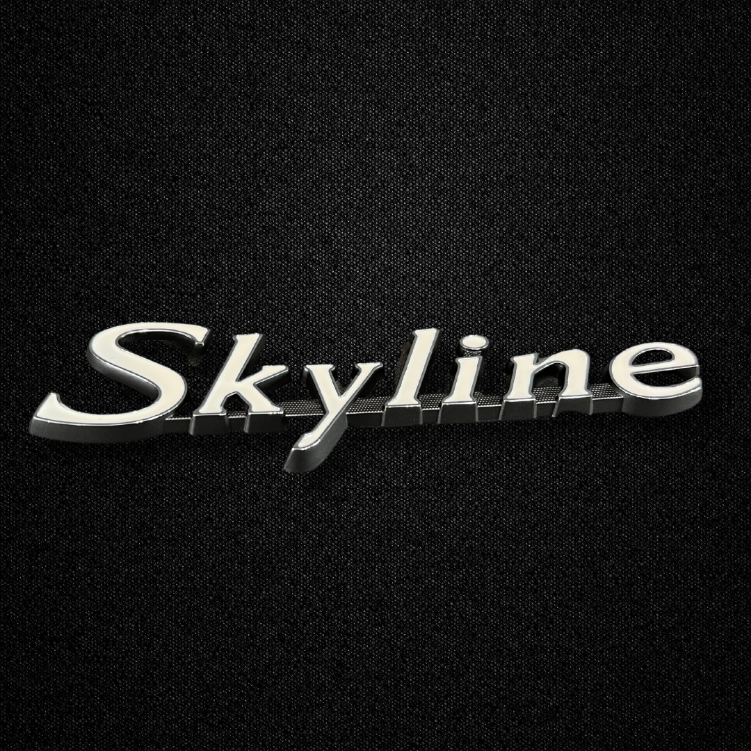 A SKYLINE front fender emblem for a GC10 Nissan Skyline 2000GT Hakosuka produced by MSpeed