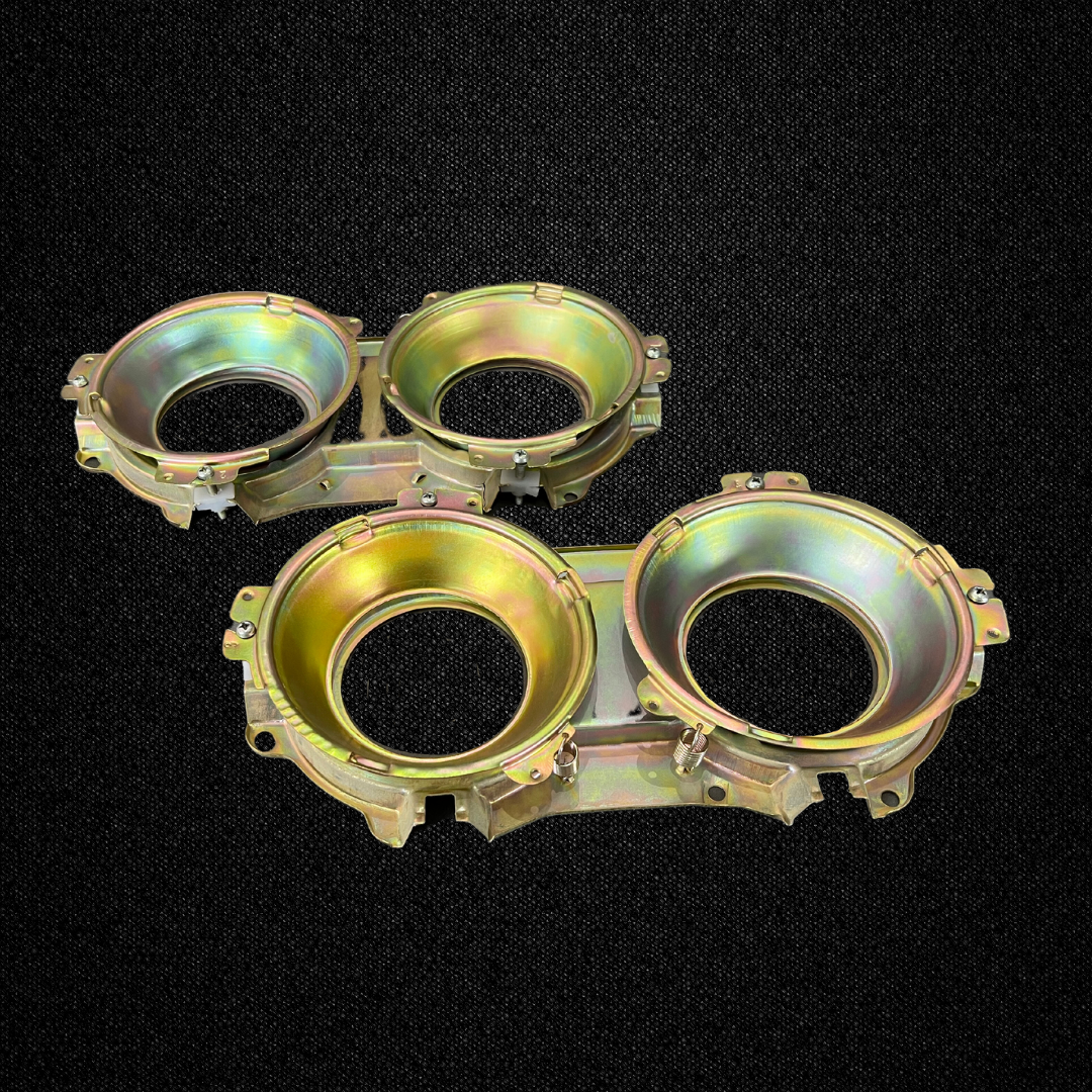 A set of headlight housings for a KGC10 Nissan Skyline 2000GT Hakosuka produced by MSpeed