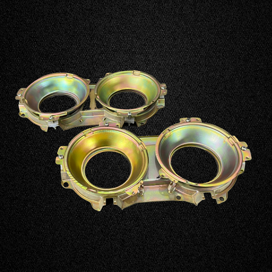 A set of headlight housings for a KGC10 Nissan Skyline 2000GT Hakosuka produced by MSpeed