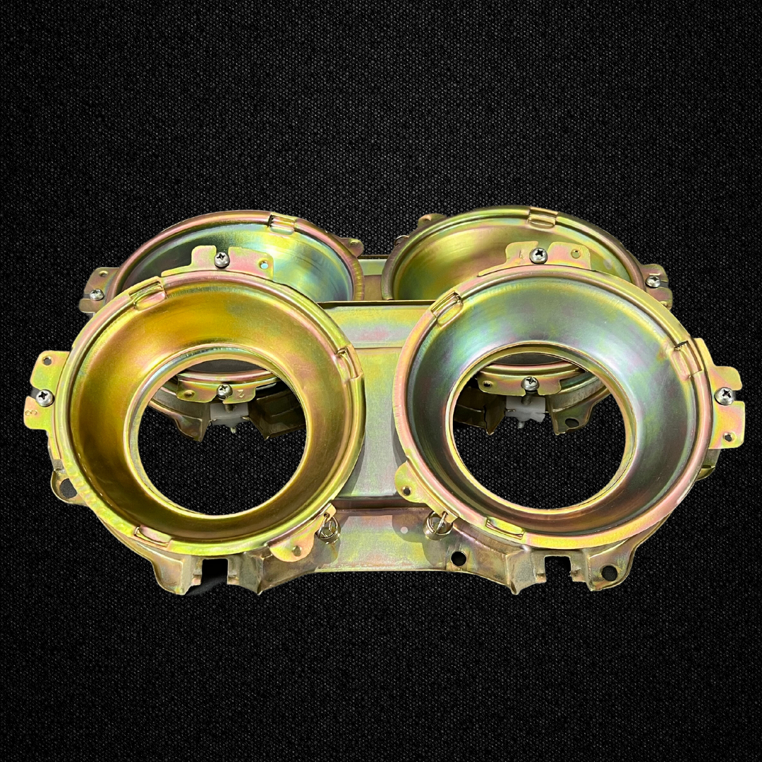 A set of headlight housings for a KGC10 Nissan Skyline 2000GT Hakosuka produced by MSpeed