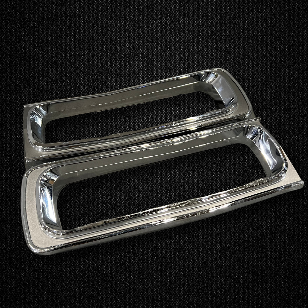A set of tail light trims for a KGC10 Nissan Skyline 2000GT Hakosuka produced by MSpeed