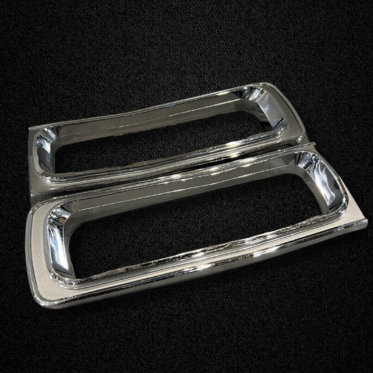A set of tail light trims for a KGC10 Nissan Skyline 2000GT Hakosuka produced by MSpeed