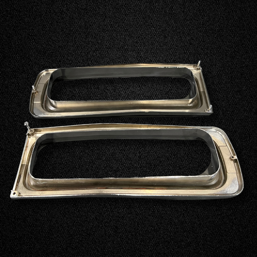 A set of tail light trims for a KGC10 Nissan Skyline 2000GT Hakosuka produced by MSpeed